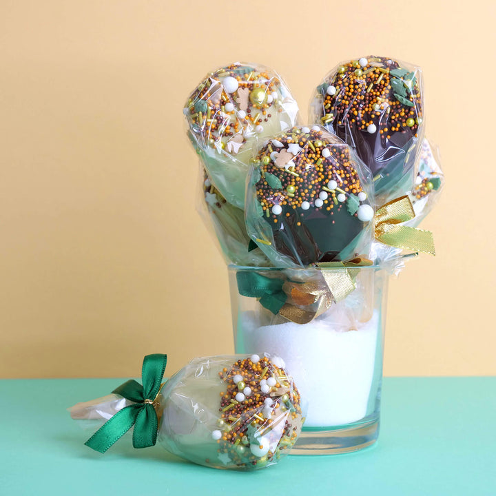 Jul-cake-popsicle med guld-gröna strössel (10 stycken)