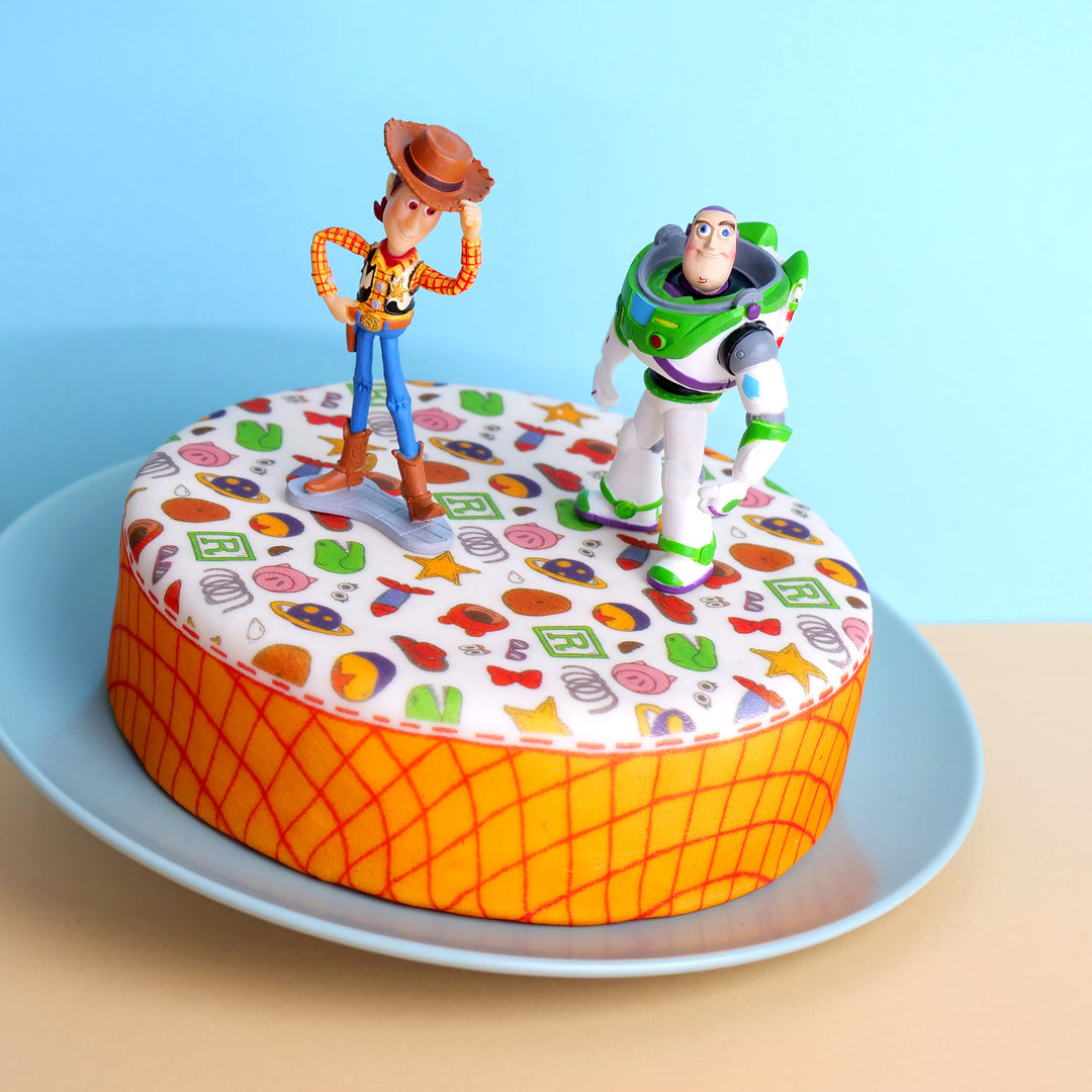 Cowboy Woody® & Buzz Lightyear® på leksakstårta