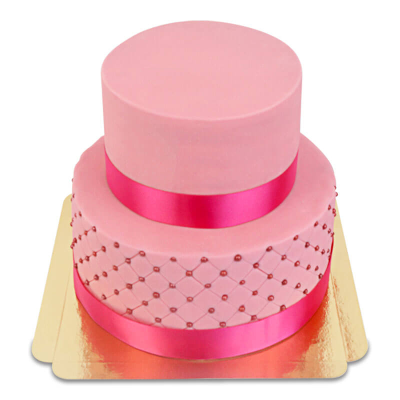 Rosa bröllopstårta med sockerpärlor